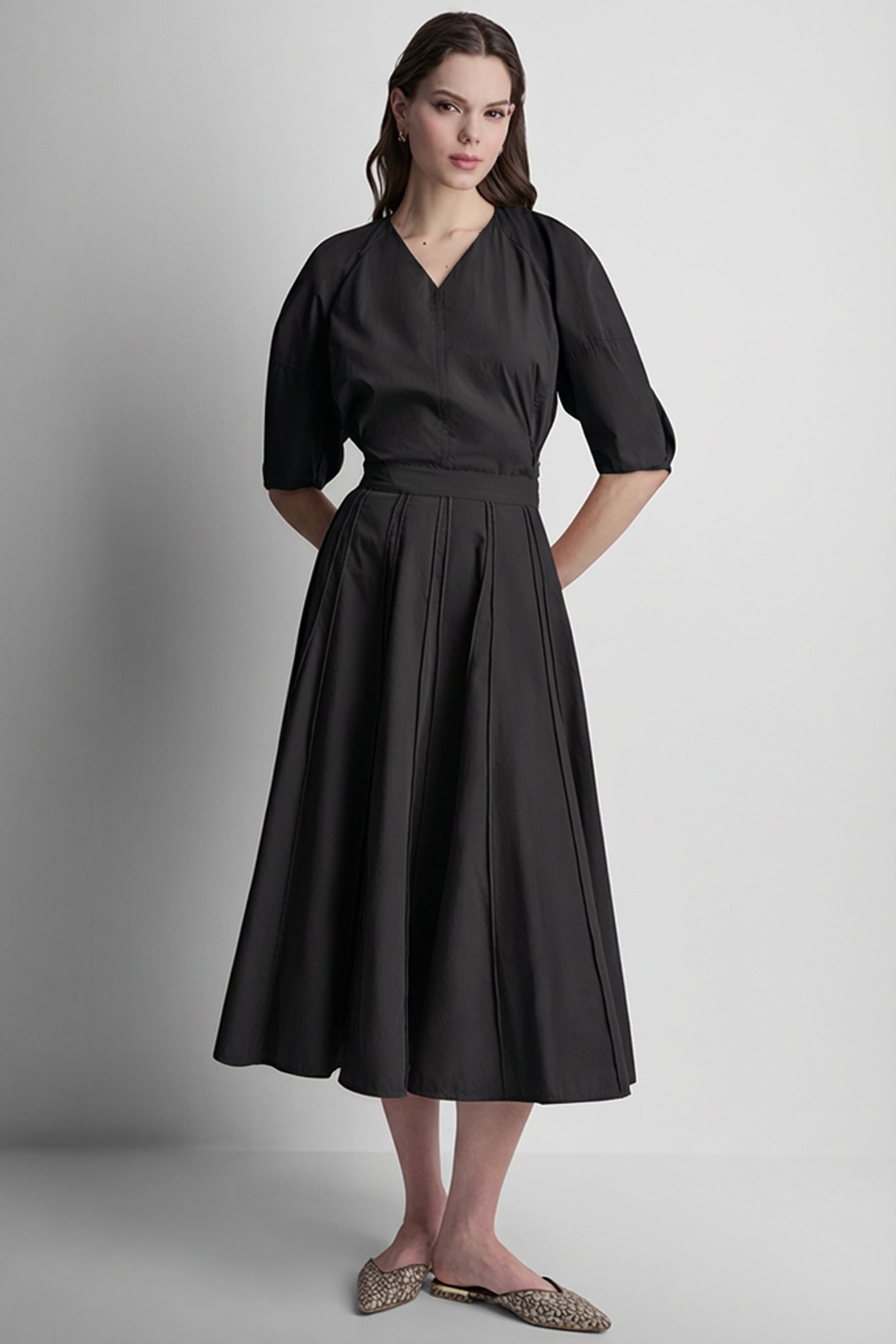 SEAMED PLEATED MIDI SKIRT